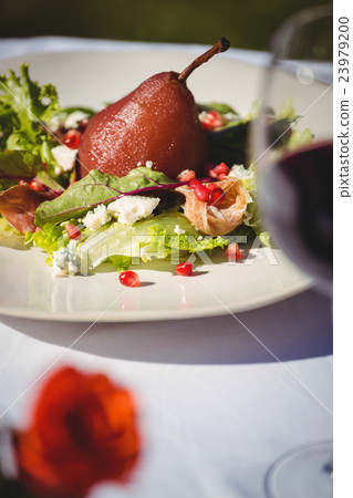 View of a poached pear salad 23979200