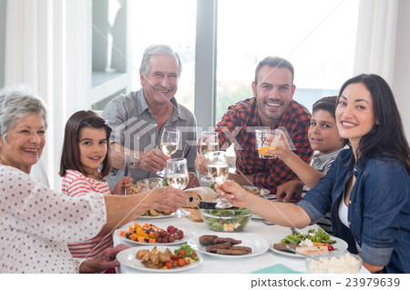 Family together having meal Family together having meal 23979639