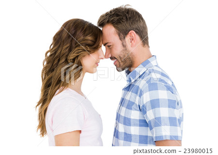 Happy young couple rubbing nose 23980015