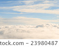 heavenly view high above the clouds 23980487