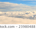 heavenly view high above the clouds 23980488