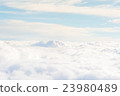 heavenly view high above the clouds 23980489