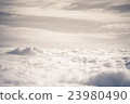 heavenly view high above the clouds 23980490