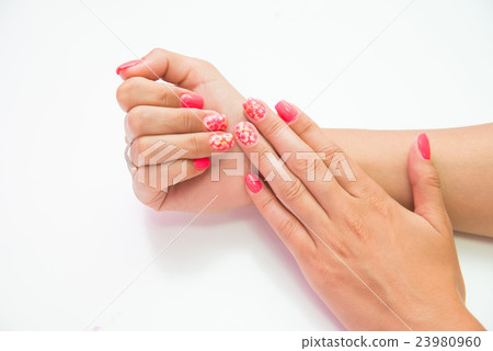 Close-up photo of woman's hand and manicure Close-up photo of woman's hand and manicure 23980960
