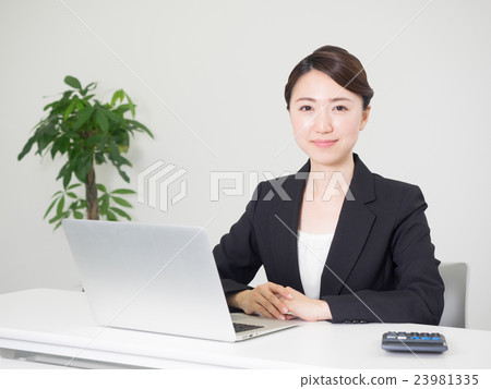 Businesswoman looking at camera 23981335