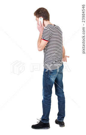back view of business man talking on mobile phone. 23984546