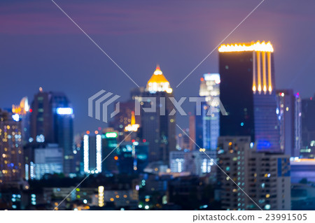 Night blurred lights, city office tower bokeh 23991505