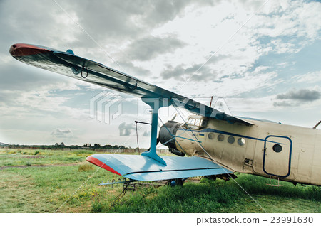 Airplanes standing on green grass. Ukraine, 2016 23991630