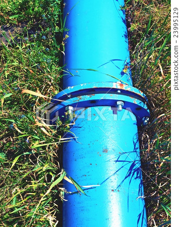 Repaired water pipes with blue flanges and screws Repaired water pipes with blue flanges and screws 23995129