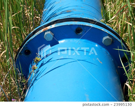 Repaired water pipes with blue flanges and screws Repaired water pipes with blue flanges and screws 23995130