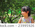 A girl walking in the park 23995926