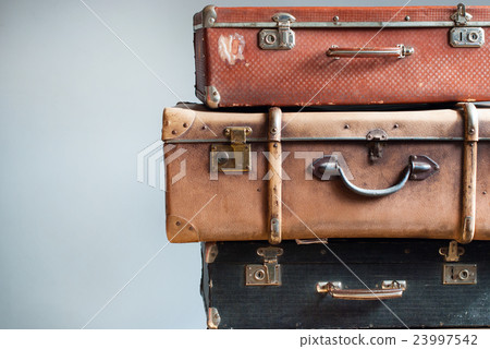 Vintage Ancient Suitcases Shabby Gray Background Vintage Ancient Suitcases Shabby Gray Background 23997542