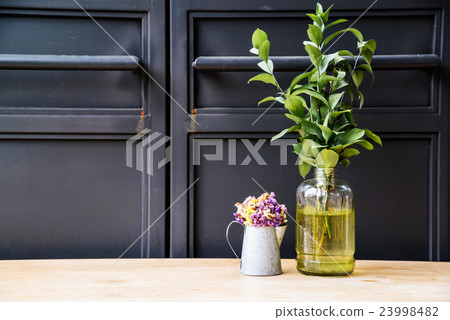 Dried flowers in a zinc bucket and plants vase Dried flowers in a zinc bucket and plants vase 23998482