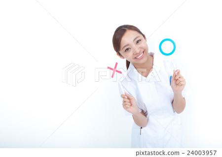 Medical image A young woman in white dress has ○ × placard Medical image A young woman in white dress has ○ × placard 24003957