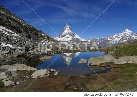 Upside-down Matterhorn reflected in Riffelzee Upside-down Matterhorn reflected in Riffelzee 24007275