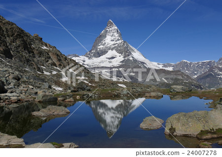 Upside-down Matterhorn reflected in Riffelzee Upside-down Matterhorn reflected in Riffelzee 24007278