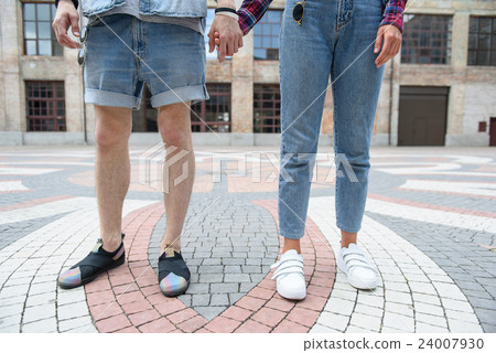 Young hipsters walking in town 24007930