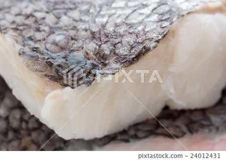 Hake fillet with skin, macro, as background 24012431