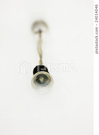 Dusty light bulb hanging from the ceiling. 24014046