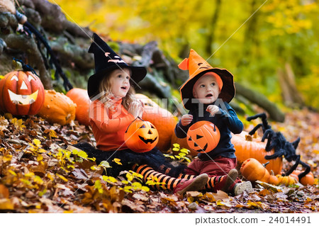 Kids with pumpkins on Halloween Kids with pumpkins on Halloween 24014491