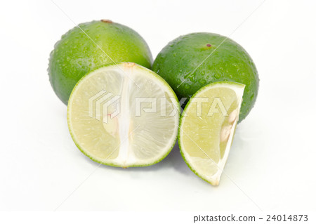 Lemon or lime fruit with half cross section 24014873