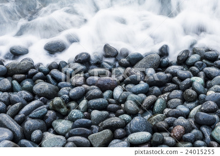 The waves are flowing in the stones The waves are flowing in the stones 24015255