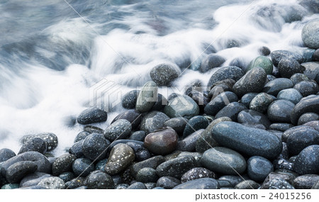 The waves are flowing in the stones The waves are flowing in the stones 24015256