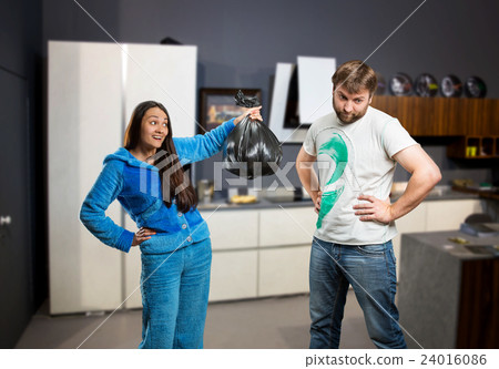 Wife asking her husband to take out the trash Wife asking her husband to take out the trash 24016086