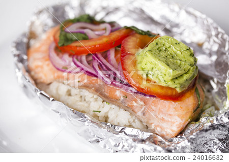 red fish baked in foil with rice, onion, oil pesto red fish baked in foil with rice, onion, oil pesto 24016682