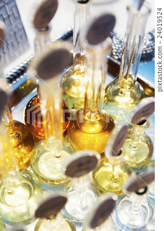 Perfume in glass bottles 24019524