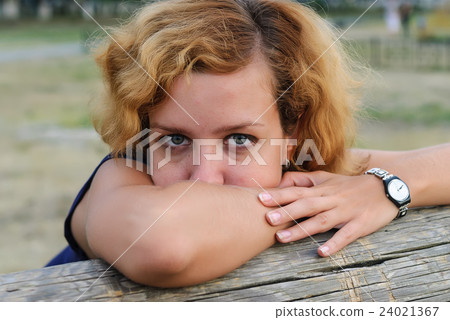 Attractive young blonde woman with freckles 24021367