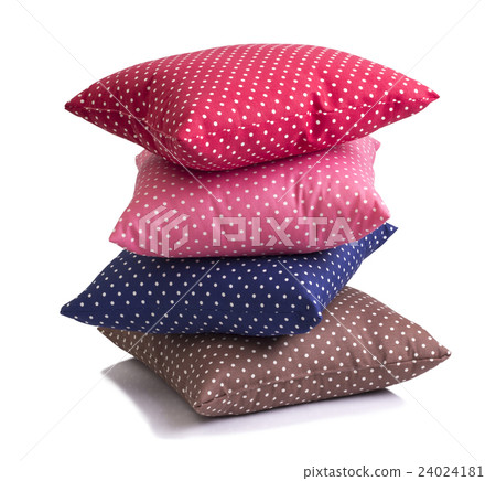 圖庫照片: stack of polka dot cushions