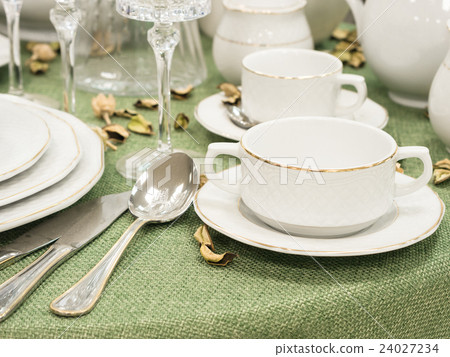 Set of dishes on table Set of dishes on table 24027234