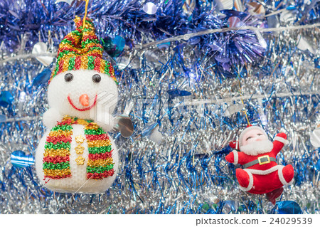 Snowman and Santa Claus on tinsel background Snowman and Santa Claus on tinsel background 24029539