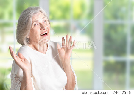 surprised senior woman portrait 24032566