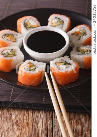 Sushi roll philadelphia and soy sauce, closeup 24033759
