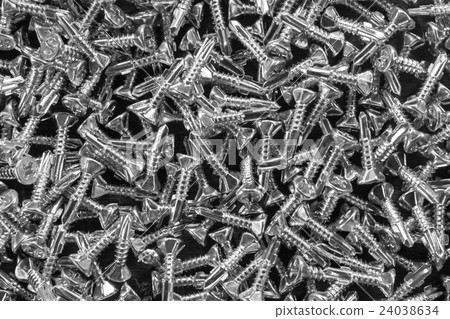 Screws background soft focus. Black and white  24038634