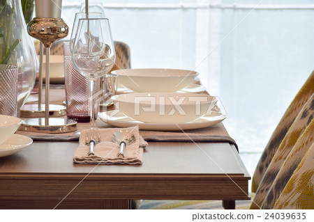 Elegence dining set on wooden table Elegence dining set on wooden table 24039635