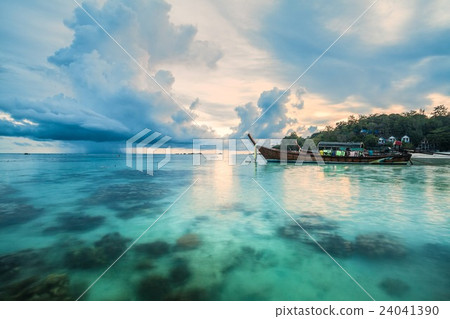 Sunset in Koh Lipe Island with coral foreground 24041390