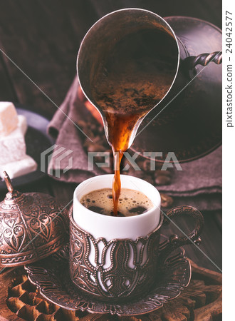 Pouring turkish coffee 24042577