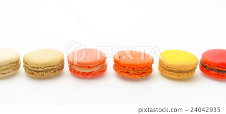 French colorful macarons on white background . 24042935