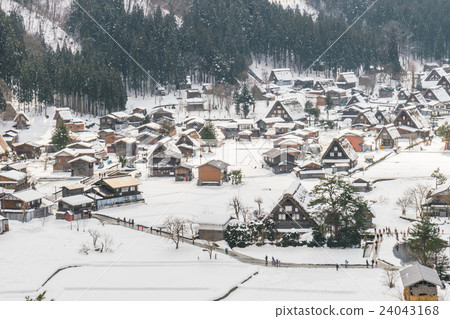 Winter Of Shirakawago with snow falling , Japan 24043168