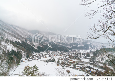 Winter Of Shirakawago with snow falling , Japan 24043171