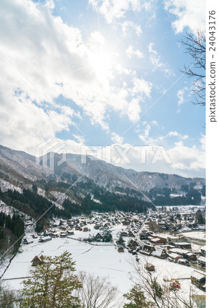 Winter Of Shirakawago with snow falling , Japan 24043176