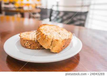 Toast bread in a white plate . Toast bread in a white plate . 24043269