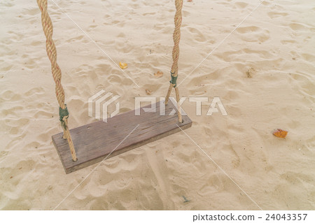 A swing on the beach A swing on the beach 24043357