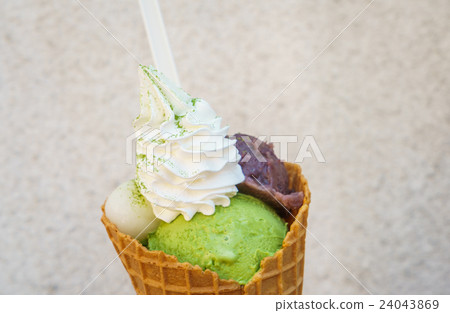 Green tea ice cream with cone 24043869