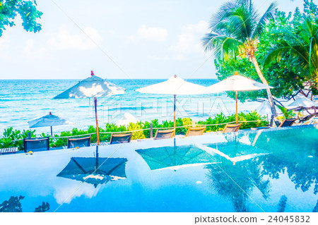 Umbrella pool and chair Umbrella pool and chair 24045832
