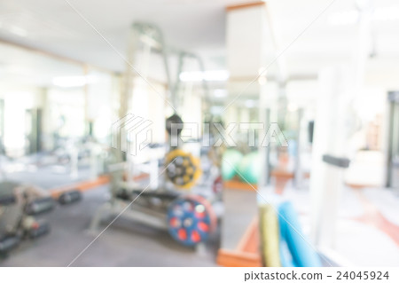 Abstract blur gym and fitness room interior 24045924