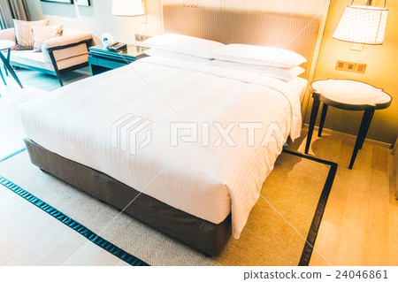 White pillow on bed 24046861